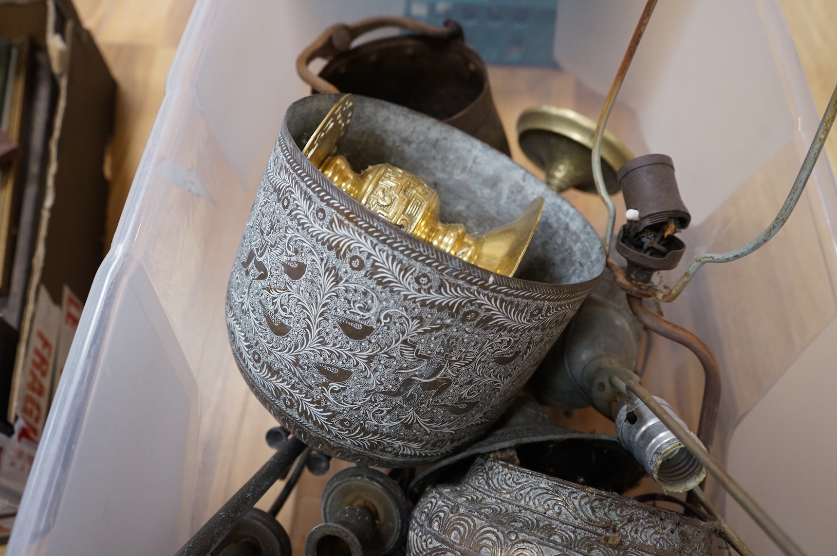 A collection mixed metal ware to include table lamps planters and a pestle and mortar